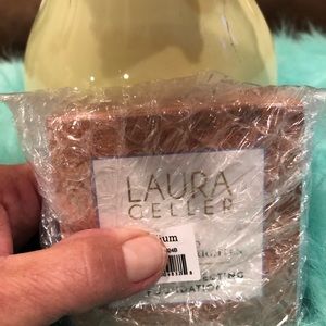 Laura Geller baked and balanced color correcting foundation in Medium